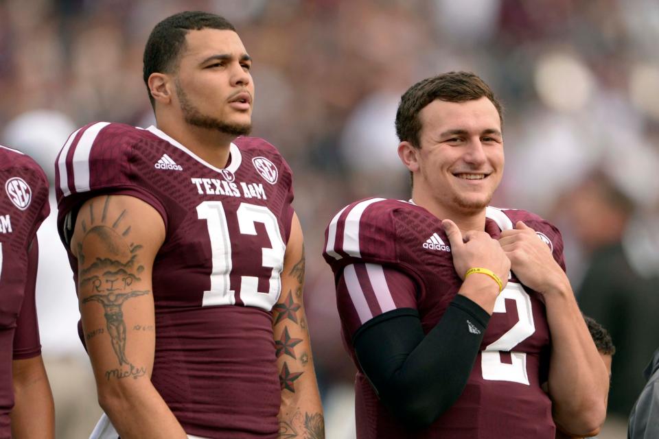 Texas A&M quarterback Johnny Manziel (2) and wide receiver Mike Evans before a game against Mississippi State at Kyle Field on Nov. 9, 2013.