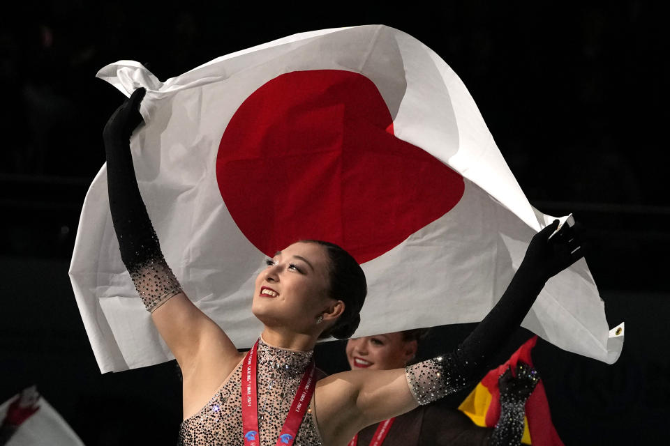 Japan's Kaori Sakamoto celebrates after winning gold in the Women's Final for the ISU Grand Prix of Figure Skating Final held in Beijing, Saturday, Dec. 9, 2023. (AP Photo/Ng Han Guan)