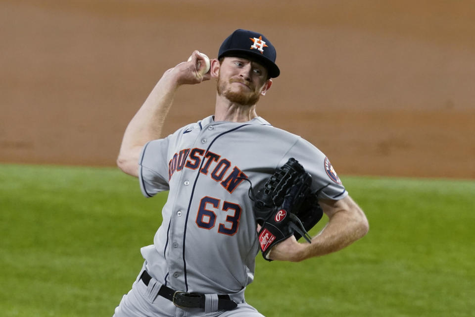 Houston Astros starting pitcher Tyler Ivey throws to a Texas Rangers batter during the second inning of a baseball game in Arlington, Texas, Friday, May 21, 2021. (AP Photo/Tony Gutierrez)