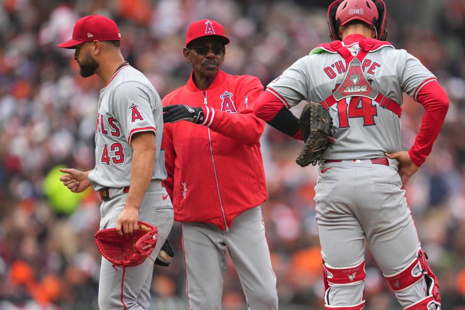 Angels manager Ron Washington removes opening day starter Patrick Sandoval in the second inning.