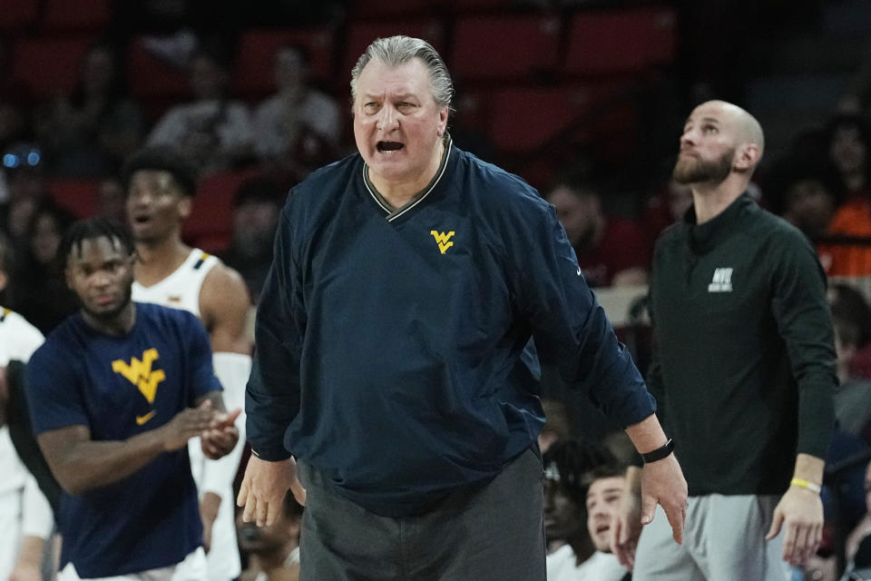 West Virginia head coach Bob Huggins shouts in the second half of an NCAA college basketball game against Oklahoma, Saturday, Jan. 14, 2023, in Norman, Okla. (AP Photo/Sue Ogrocki)