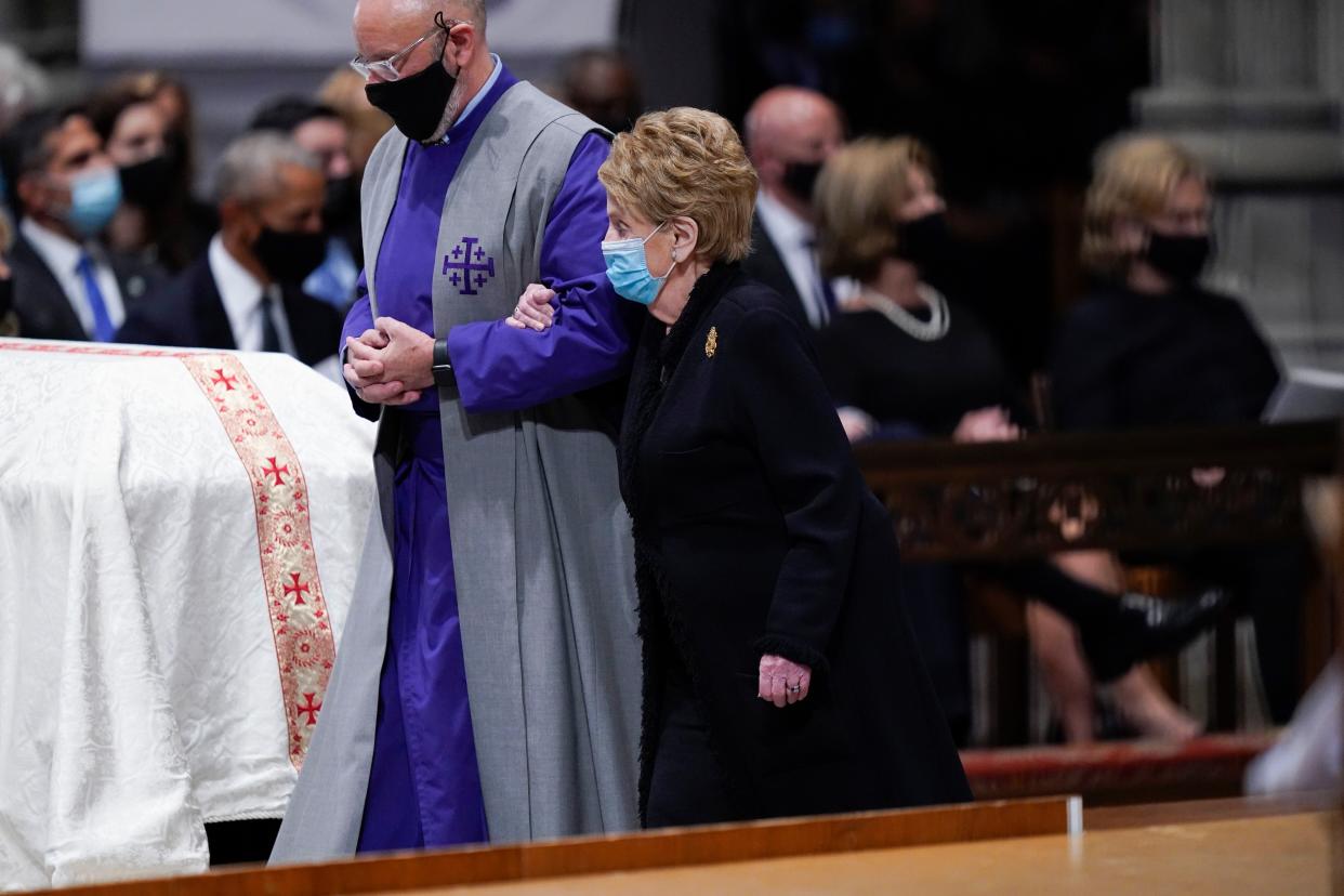 Former Secretary of State Madeleine Albright walks by the casket of former Secretary of State Colin Powell during a funeral service at the Washington National Cathedral, Friday, Nov. 5, in Washington. 