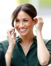 <p>Meghan's wedding band is also gold in keeping with royal tradition. She sported gold charm bracelets, a gold ring, and a matching necklace to an appearance at the University of Chichester in May 2018. <br></p>
