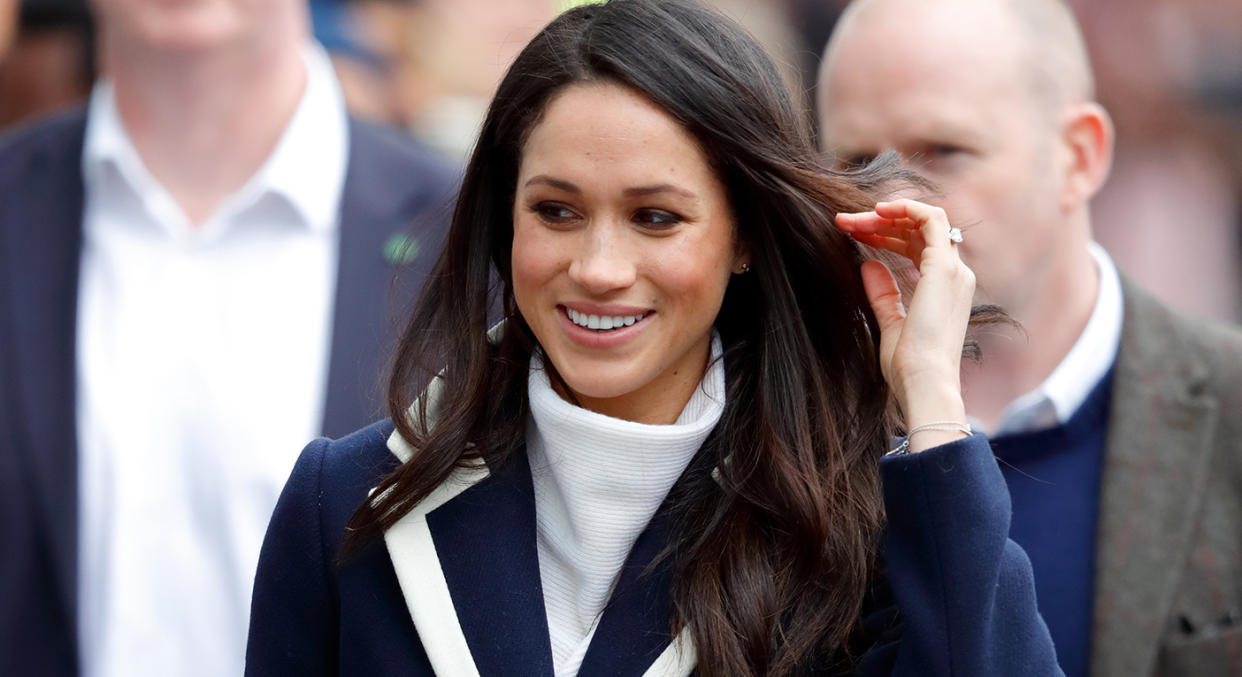 Meghan Markle first wore the Allsaints Ridley jumper in 2018, and again in the Sussex's Christmas e-card