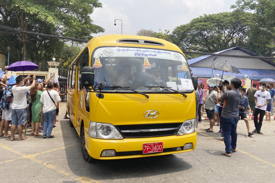 A bus carrying released prisoners leaves Insein Prison in Yangon, Myanmar Wednesday, May 3, 2023. Myanmar’s ruling military council on Wednesday said it was releasing more than 2,100 political prisoners as a humanitarian gesture. Thousands more remain imprisoned on charges generally involving nonviolent protests or criticism of military rule, which began when the army seized power in February 2021 from the elected government of Aung San Suu Kyi. (AP Photo/Thein Zaw)