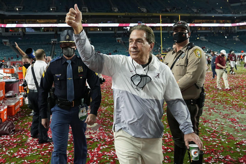 FILE - Alabama head coach Nick Saban leaves the field after their win against Ohio State in the NCAA College Football Playoff national championship game in Miami Gardens, Fla., in this Tuesday, Jan. 12, 2021, file photo. The National signing day period begins Wednesday, Feb. 3, 2021. (AP Photo/Lynne Sladky, File)