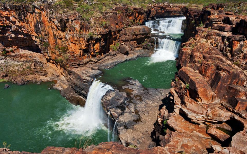 Regular helicopter tours fly over the Mitchell Falls