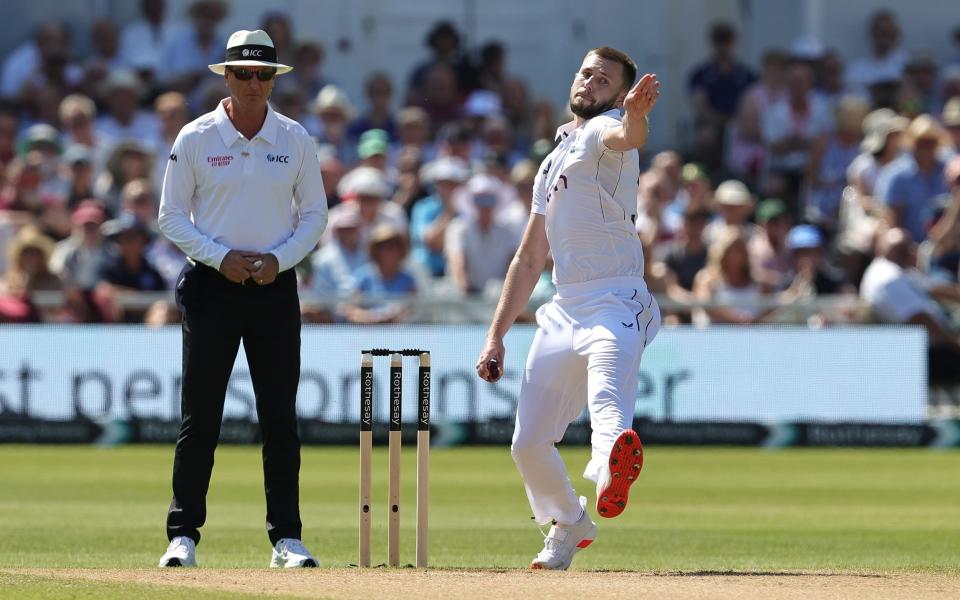 Gus Atkinson bowls on the second morning at Trent Bridge