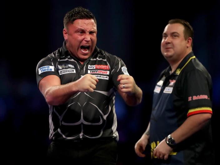 Gerwyn Price edged out Kim Huybrechts in a tense contest on Monday night (Bradley Collyer/PA) (PA Wire)