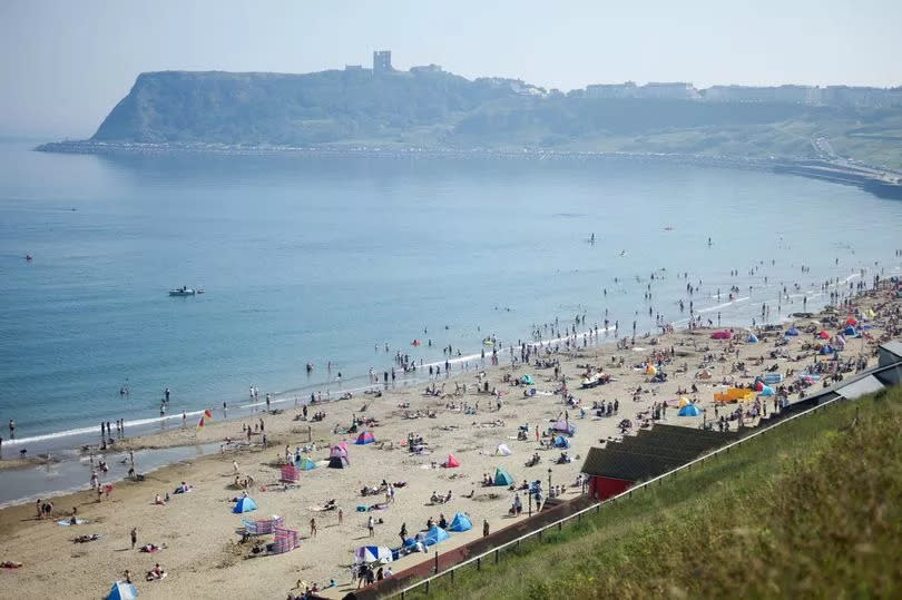 Views of Scarborough beach as thousands of people enjoy warm weather