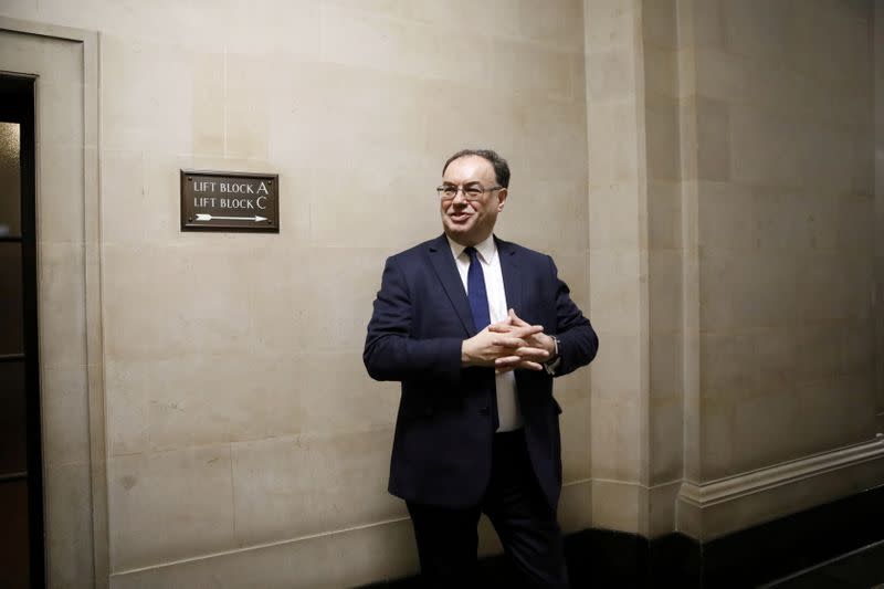 FILE PHOTO: Bank of England Governor Andrew Bailey poses for a photograph on the first day of his new role at the Central Bank in London