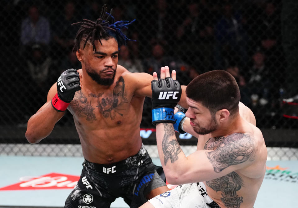 LAS VEGAS, NEVADA – APRIL 06: (L-R) Morgan Charriere of France punches Chepe Mariscal in a featherweight fight during the UFC Fight Night event at UFC APEX on April 06, 2024 in Las Vegas, Nevada. (Photo by Jeff Bottari/Zuffa LLC via Getty Images)