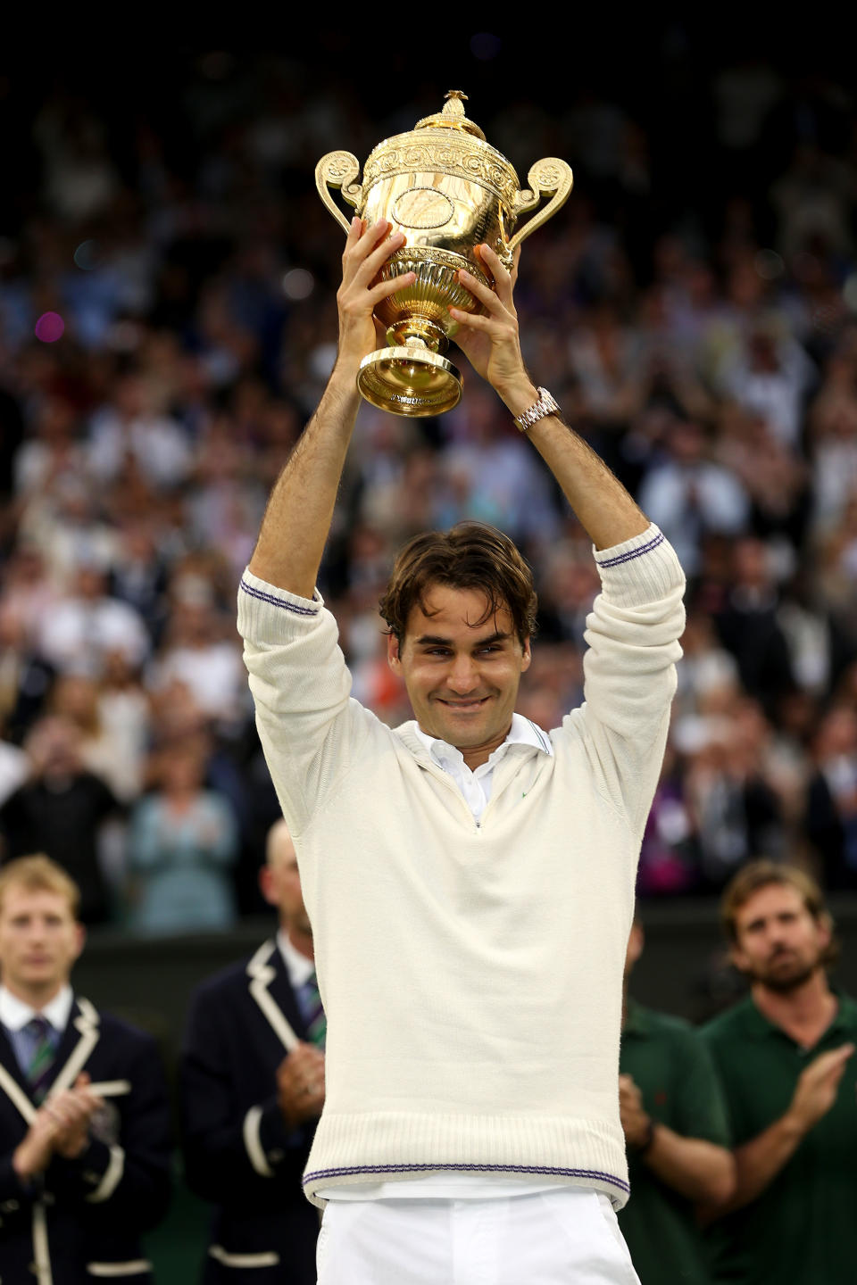 <p>Roger Federer lifts the Wimbledon title, once again, in 2012. </p>