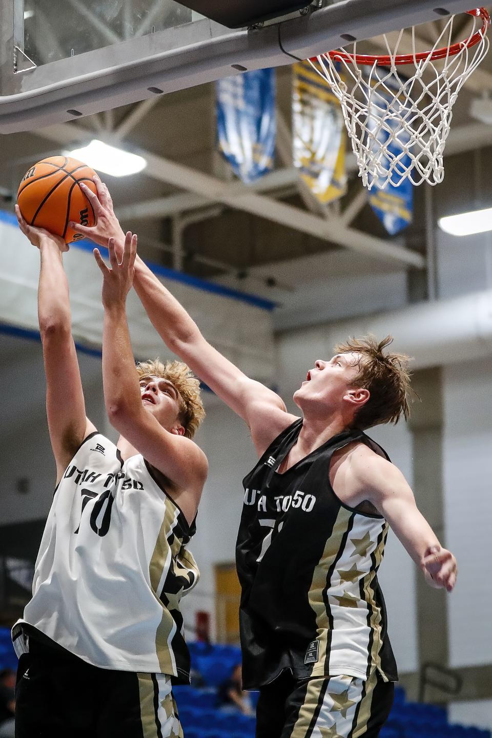 Logan Deal (70), from Sky View High School, has his shot blocked by Jaxon Johnson (76), from Alta High School, during the Utah Top 50 Elite League play at Salt Lake Community College’s Bruin Arena in Taylorsville, Utah on Monday, Sept. 26, 2022 | Adam Fondren, for the Deseret News