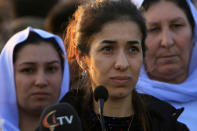 Nobel Peace Prize laureate, Yazidi activist Nadia Murad talks to people during her visit to Sinjar, Iraq December 14, 2018. REUTERS/Ari Jalal