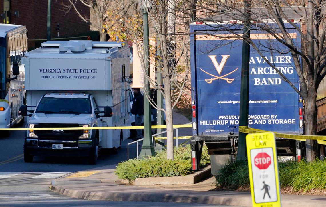 A Virginia State Police crime scene investigation truck is on the scene of an overnight shooting at the University of Virginia, Monday, Nov. 14, 2022, in Charlottesville. Va. (AP Photo/Steve Helber)