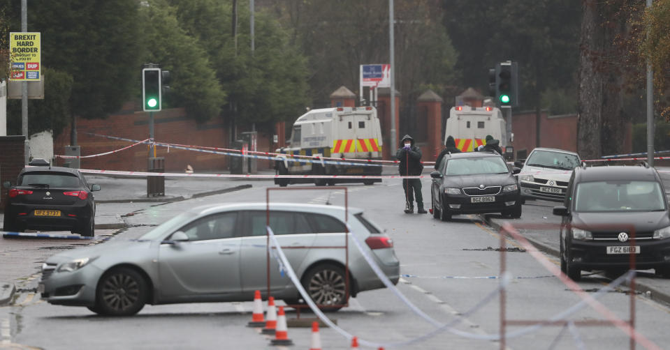 Police at the scene of the shooting in Glen Road, west Belfast (Niall Carson/PA)