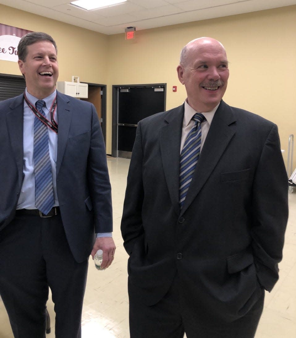 At a meet and greet prior to the Feb. 1 selectmen's meeting, Berkley's new Town Administrator Mark Stankievicz, right, shares a laugh with retired Easton Fire Chief Kevin Partridge, left, who has been serving as interim Berkley town administrator.