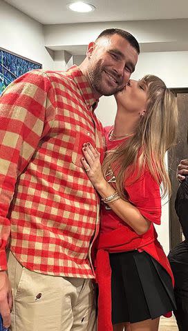 <p>Chariah Gordon/Instagram</p> Taylor Swift kissing Travis Kelce's cheek after a Chiefs game