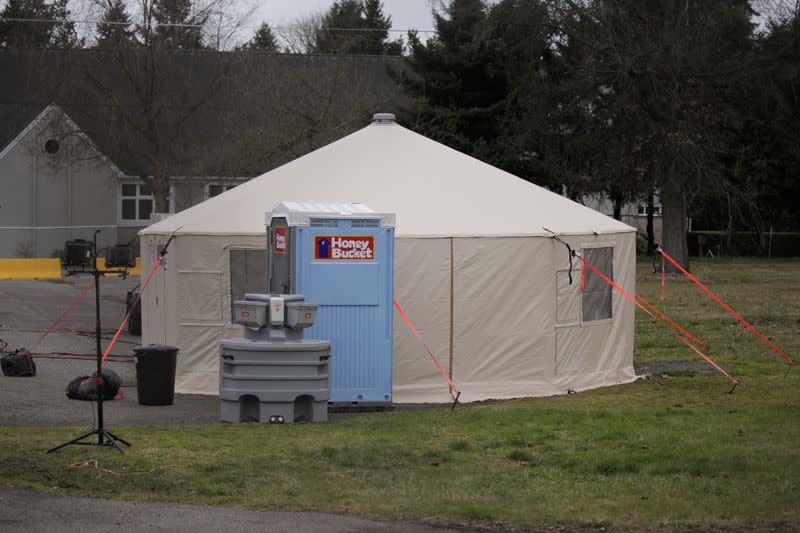 A support operations tent is seen at a earmarked quarantine site for healthy people potentially exposed to novel coronavirus, behind Washington State Public Health Laboratories in Shoreline, north of Seattle