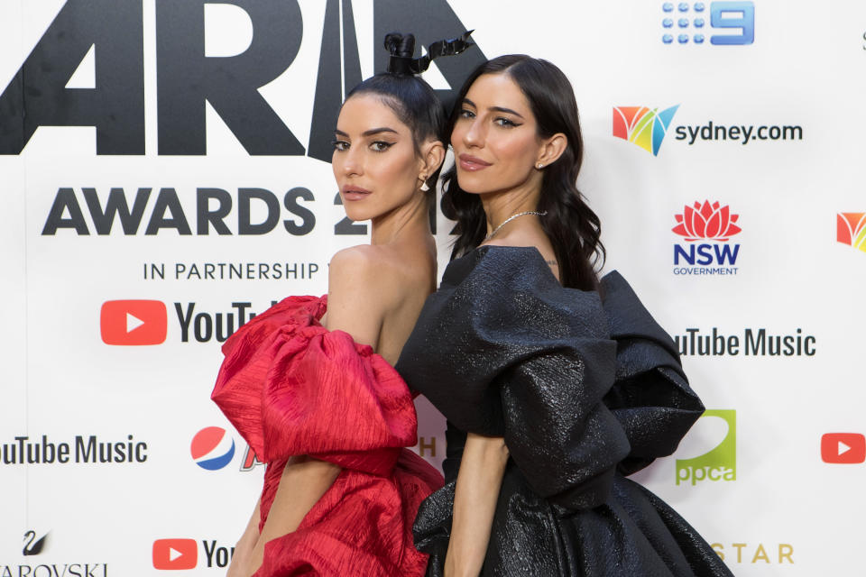 Lisa Origliasso and Jessica Origliasso of The Veronicas pose on the red carpet at the 33rd Annual ARIA Awards 2019 at The Star on November 27, 2019 in Sydney, Australia