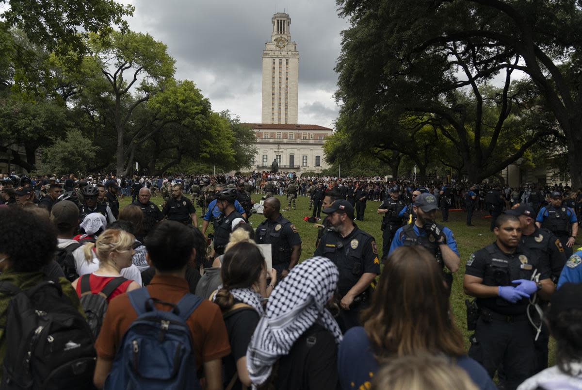 Protesters on Wednesday during a student demonstration in support of Palestinians at the University of Texas at Austin campus. <cite>Credit: Julius Shieh/The Texas Tribune</cite>