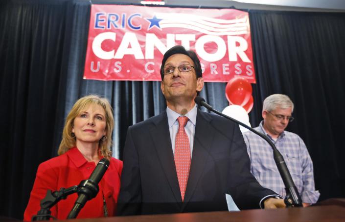 House Majority Leader Eric Cantor, R-Va., delivers his concession speech as his wife, Diana, listens in Richmond, Va., Tuesday, June 10, 2014. Cantor lost in the GOP primary tp tea party candidate Dave Brat. (AP Photo/Steve Helber)