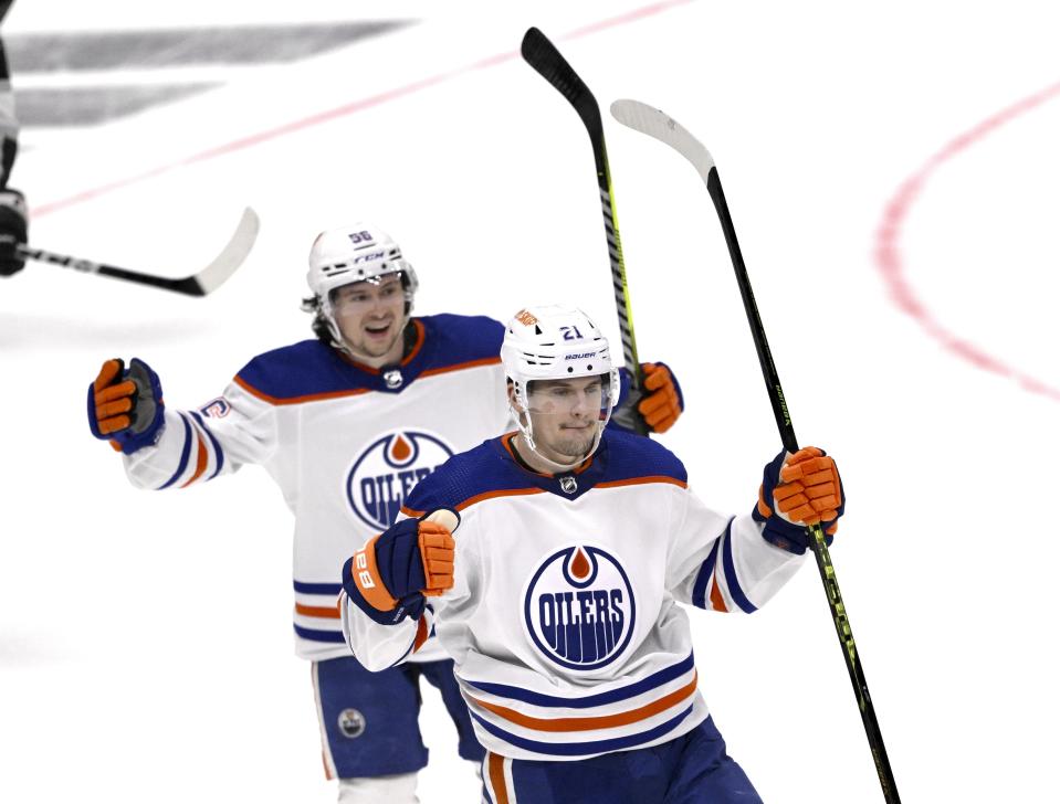 Edmonton Oilers' Klim Kostin, front, and Kailer Yamamoto celebrate Kostin's goal against the Los Angeles Kings during the second period in Game 6 of an NHL hockey Stanley Cup first-round playoff series in Los Angeles on Saturday, April 29, 2023. (Keith Birmingham/The Orange County Register via AP)