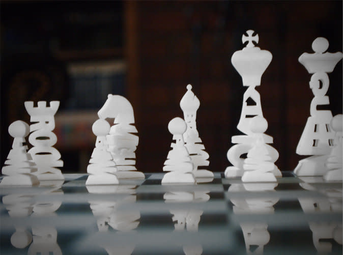 Have trouble remembering what different chess pieces are called? We love that each piece in this 3D printed chess set is constructed by the letters in its name.  <a href="http://www.shapeways.com/model/195224/typographical-chess-set.html">Purchase a set here</a>. 