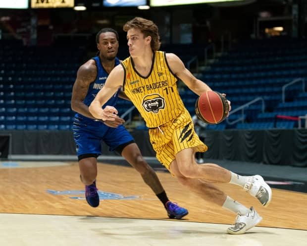 Keevan Veinot of the Hamilton Honey Badgers, ahead, posted a career-high 21 points against the Guelph Nighthawks in CEBL action at the FirstOntario Centre on Monday. (Christian Bender/Guelp Nighthawks - image credit)