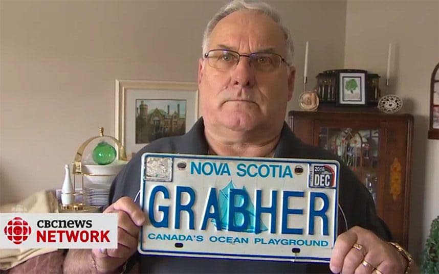 Lorne Grabher with his licence plate - CBCNews