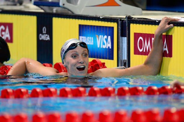 Il y a quatre ans, Dana Vollmer a quitté les qualifications américaines avec la déception de ne pas avoir pu se qualifier pour aucun des quatre évènements de nage olympique. Elle a récemment pu exorciser ses démons cette année en remportant le 100 mètres papillon, obtenant du coup son billet pour les Jeux de Londres. (Jamie Squire/Getty Images)