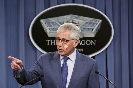 U.S. Secretary of Defense Chuck Hagel speaks at a news briefing to announce reforms to the nuclear enterprise at the Pentagon in Washington, November 14, 2014. REUTERS/Yuri Gripas