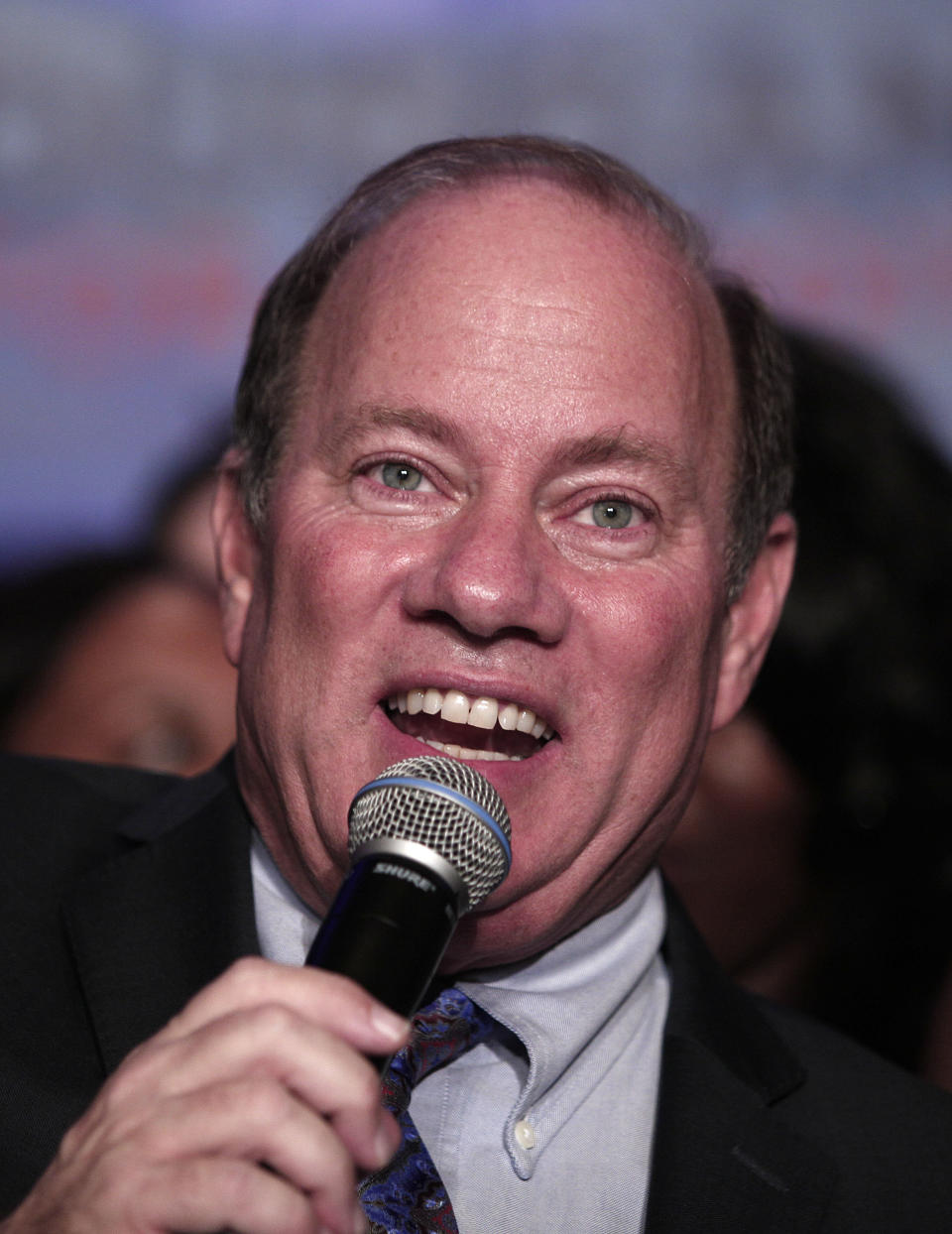 Mike Duggan celebrates his election as the new mayor of Detroit at a victory party at the Renaissance Center November 5, 2013 in Detroit, Michigan. (Photo by Bill Pugliano/Getty Images)