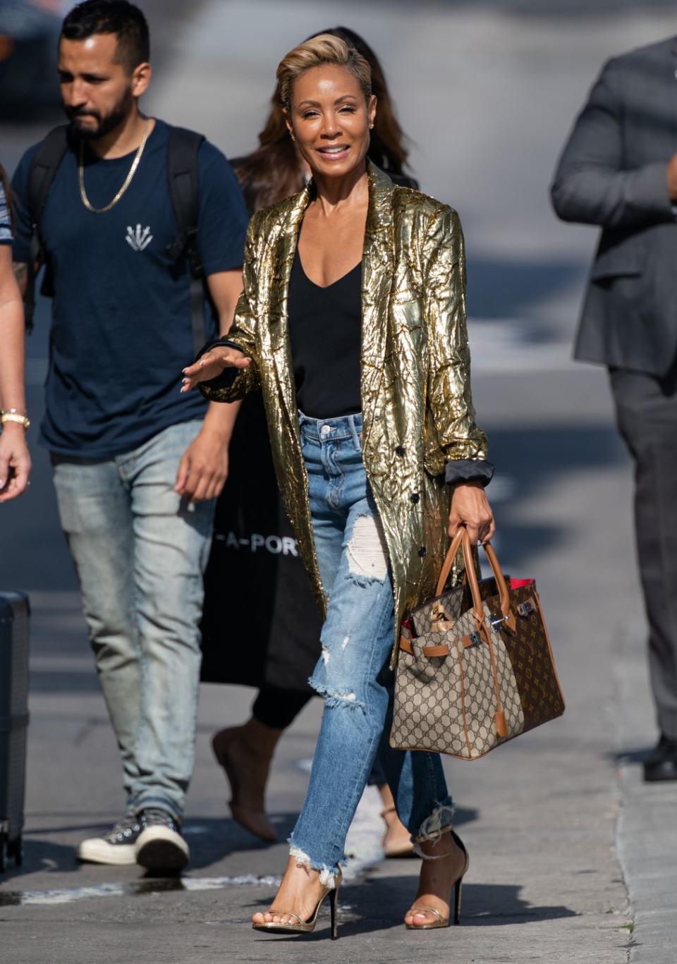 <p>Metallics are definitely having a moment. We love the high/low treatment Jada Pinkett Smith is giving this gold number. Shine on! </p>