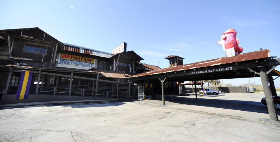 This March 1, 2014 photo shows Felix's Fish Camp Grill in Spanish Fort, Ala. The business is one of more than a half-dozen restaurants on "Seafood Row," located on a parkway across the Mobile Delta at Mobile, Ala. Many locals know the area for family-style seafood, but visitors sometimes have a difficult time finding it. (AP Photo/Jay Reeves)