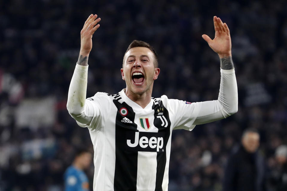 Juventus' Federico Bernardeschi celebrates at the end of the Champions League round of 16, 2nd leg, soccer match between Juventus and Atletico Madrid at the Allianz stadium in Turin, Italy, Tuesday, March 12, 2019. (AP Photo/Antonio Calanni)