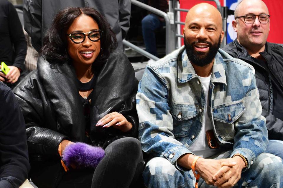 <p>Adam Pantozzi/NBAE/Getty</p> Jennifer Hudson and Common in Los Angeles on Jan. 10, 2024