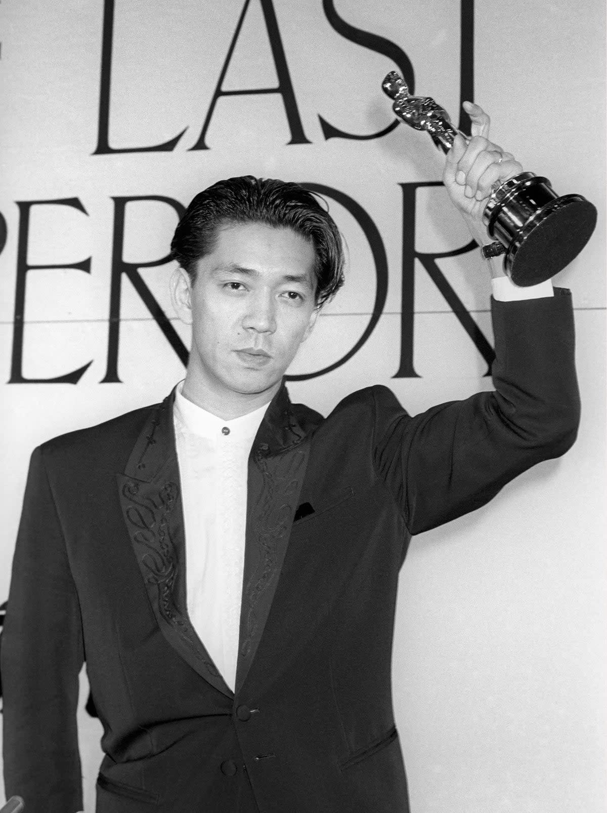 Sakamoto after winning an Academy award for ‘The Last Emperor’ in Tokyo, April 1988 (AP)