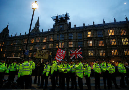 Police officers stand outside the Houses of Parliament, ahead of a vote on Prime Minister Theresa May's Brexit deal, in London, Britain, January 15, 2019. REUTERS/Henry Nicholls