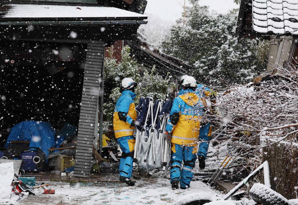 Rescuers conduct searches for survivors as snow hampers rescue operations in the city of Suzu, Ishikawa prefecture on January 7, 2024, after a major 7.5 magnitude earthquake struck the Noto region in Ishikawa prefecture on New Year's Day.