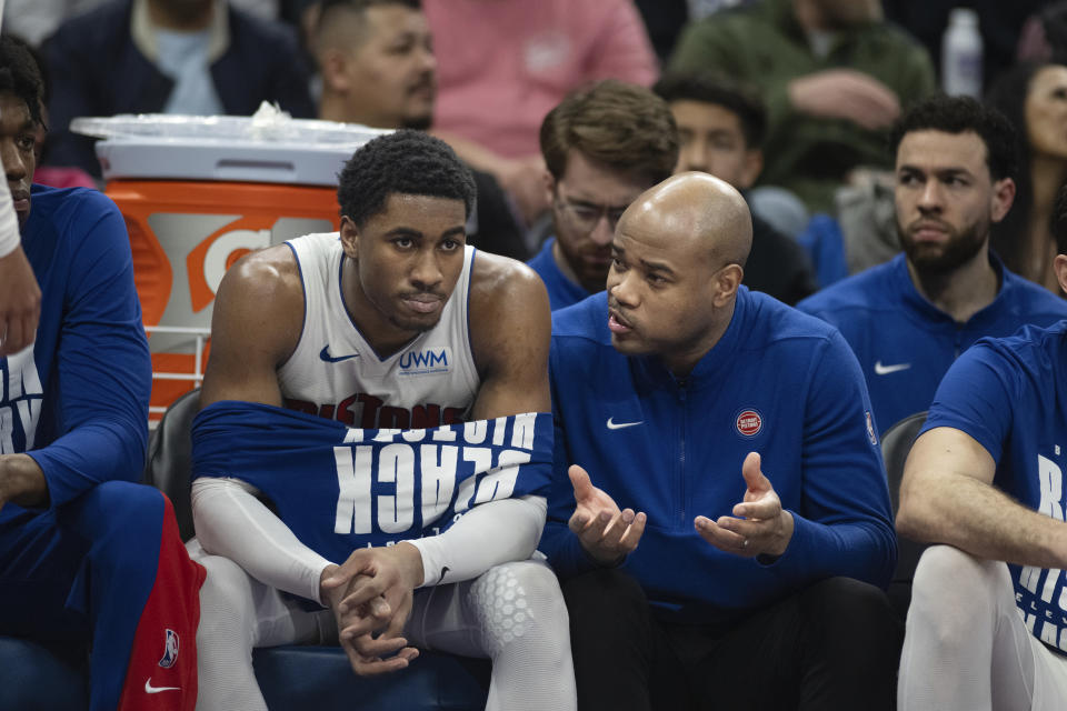 Detroit Pistons assistant coach Jarrett Jack talks with guard Jaden Ivey during the first half of the team's NBA basketball game against the Sacramento Kings in Sacramento, Calif., Wednesday, Feb. 7, 2024. (AP Photo/José Luis Villegas)