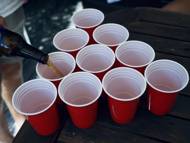 Red Solo Cups And Beer Bottles Stock Photo - Download Image Now - Cup,  Individual Event, Red - iStock