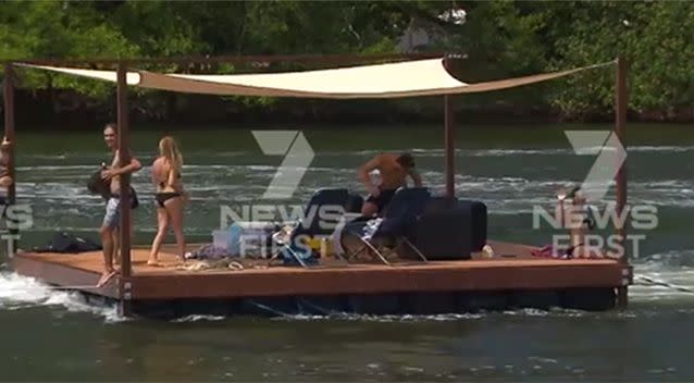 A jetski has been seen dragging a floating pontoon around the Gold Coast today. Source: 7 News Gold Coast