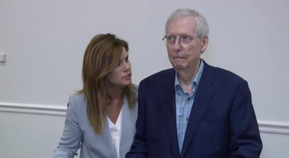 Robbin Taylor, State Director to U.S. Senate Minority Leader Mitch McConnell, R-Ky., joins McConnell while he speaks Wednesday, Aug. 30, 2023, in Covington, Kentucky.