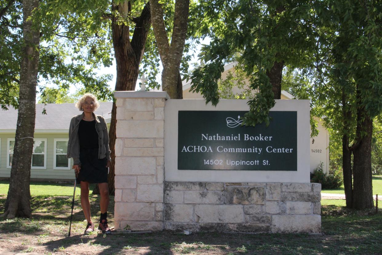 Keree Brannen, a resident of the Austin’s Colony neighborhood in eastern Travis County, stands in front of the community center where residents gathered Saturday to discuss the condition of their tap water. Brannen has had to replace the appliances in the house she bought new seven years ago because of the poor quality of her water, she said.