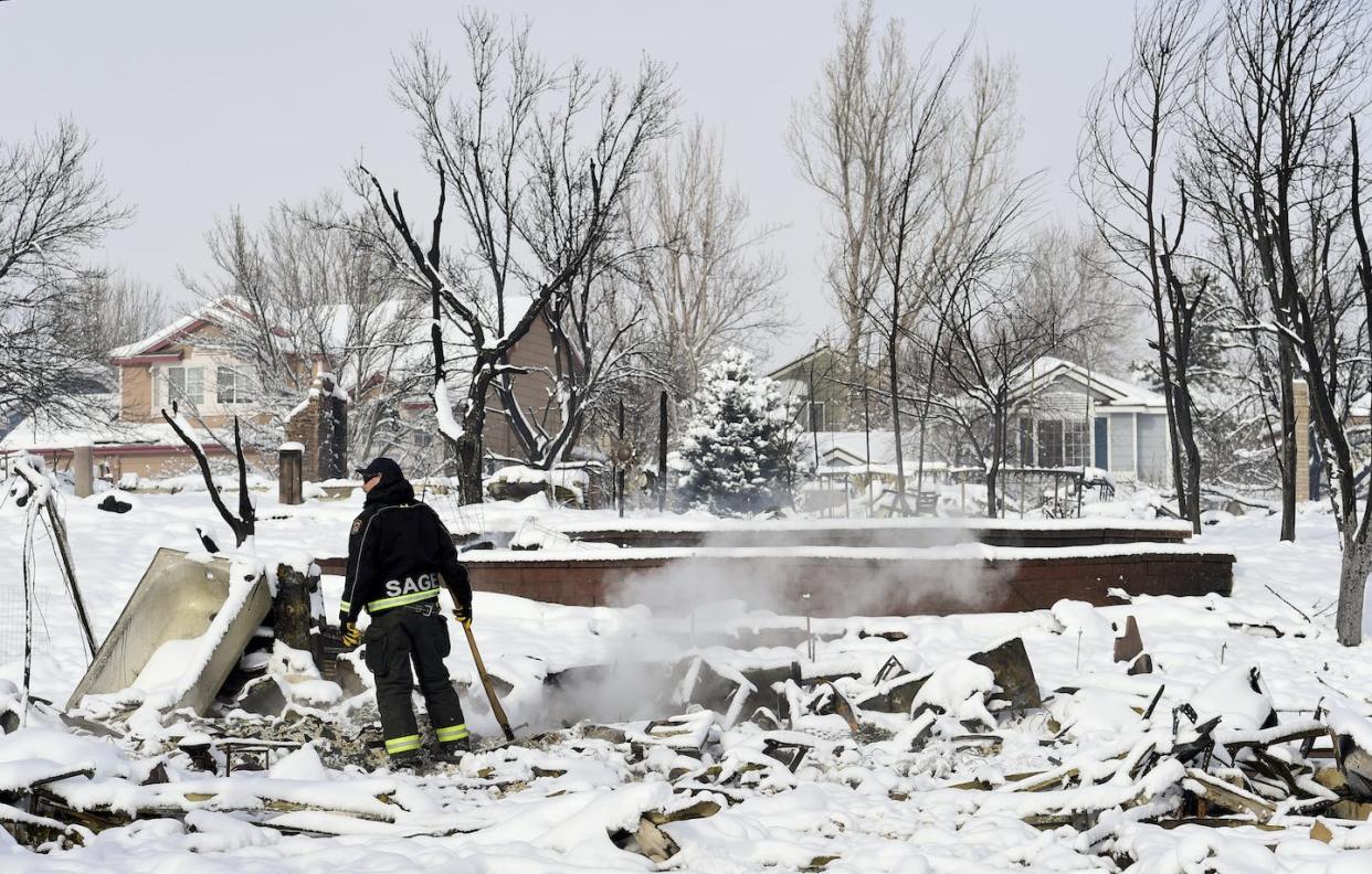 Homes that survived the Marshall Fire didn't come through unscathed. <a href="https://www.gettyimages.com/detail/news-photo/thornton-firefighter-checks-a-hot-spot-in-the-remains-of-a-news-photo/1370768947" rel="nofollow noopener" target="_blank" data-ylk="slk:Matthew Jonas/MediaNews Group/Boulder Daily Camera via Getty Images;elm:context_link;itc:0;sec:content-canvas" class="link ">Matthew Jonas/MediaNews Group/Boulder Daily Camera via Getty Images</a>