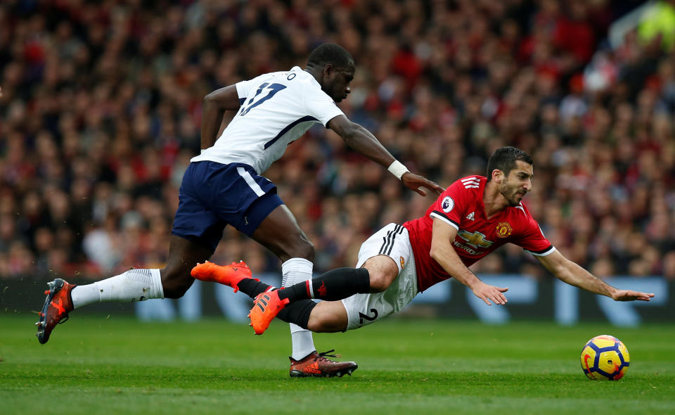 <p>Tottenham’s Moussa Sissoko and Manchester United’s Henrikh Mkhitaryan clash</p>