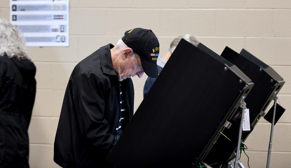 Jerry Ryan of Canton votes on Election Day at Canton's First Friends Church polling location on Tuesday.