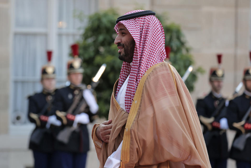 Saudi Crown Prince Mohammed bin Salman arrives to meet French President Emmanuel Macron for a dinner at the Elysee Palace in Paris, Thursday July 28, 2022. French President Emmanuel Macron welcomed Saudi Crown Prince Mohammed bin Salman to his presidential palace and offer him dinner, marking another step in the Saudi leader's diplomatic rehabilitation less than four years after the killing of writer and critic Jamal Khashoggi. (AP Photo/Lewis Joly)